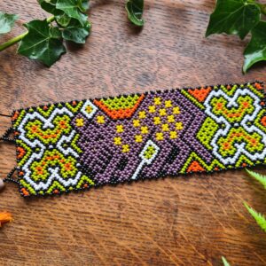 Shipibo purple Jaguar beaded bracelet from the Amazon