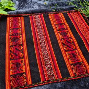 Traditional Andian print orange black woollen fabric altar ceremonial space
