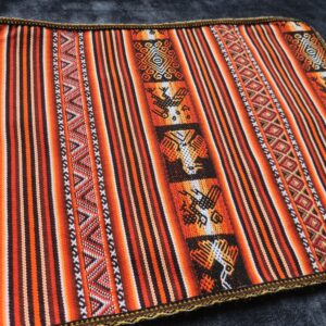 Traditional Andian print orange woollen fabric altar ceremonial space